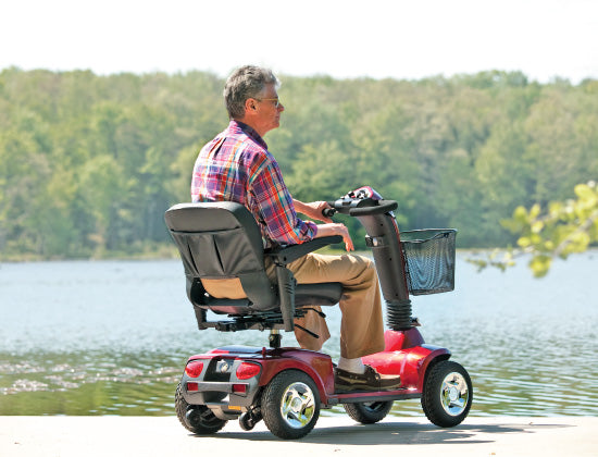 Four wheel mobility scooter by the lake